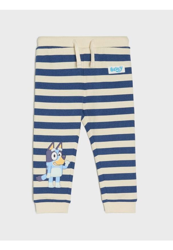 Sinsay - Spodnie Bluey - kremowy. Kolor: kremowy