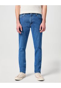 Wrangler - MĘSKIE SPODNIE JEANSOWE WRANGLER RUSTLER SLIM INDIGO MID W10ERC81D. Okazja: na co dzień. Sezon: lato. Styl: klasyczny, casual, elegancki