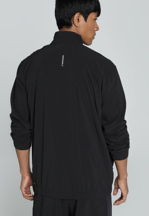 Kurtka z dresu Puma Velocity. Kolor: czarny. Materiał: dresówka