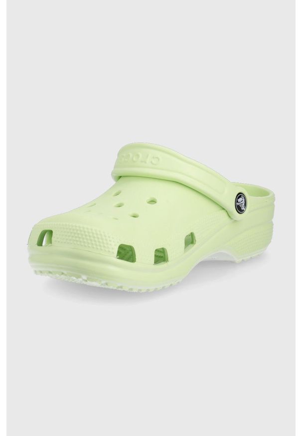 Crocs klapki Classic damskie kolor zielony. Nosek buta: okrągły. Kolor: zielony. Materiał: guma, materiał. Wzór: gładki