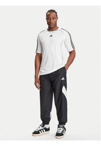 Adidas - adidas Spodnie dresowe Stadium JN1830 Czarny Loose Fit. Kolor: czarny. Materiał: syntetyk #5