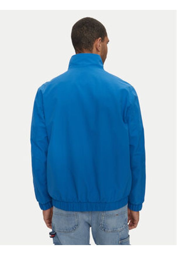 Tommy Jeans Kurtka bomber Essential DM0DM17982 Niebieski Regular Fit. Kolor: niebieski. Materiał: syntetyk