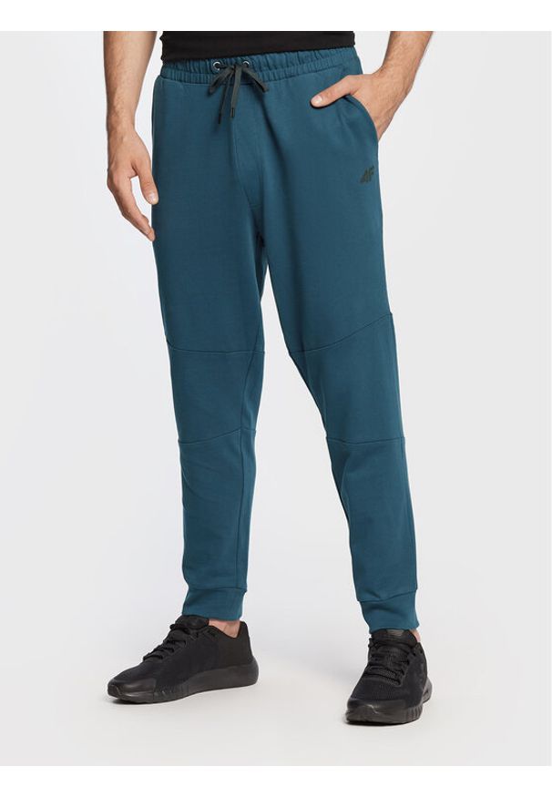 4f - 4F Spodnie dresowe H4Z22-SPMD012 Granatowy Regular Fit. Kolor: niebieski. Materiał: dresówka, bawełna