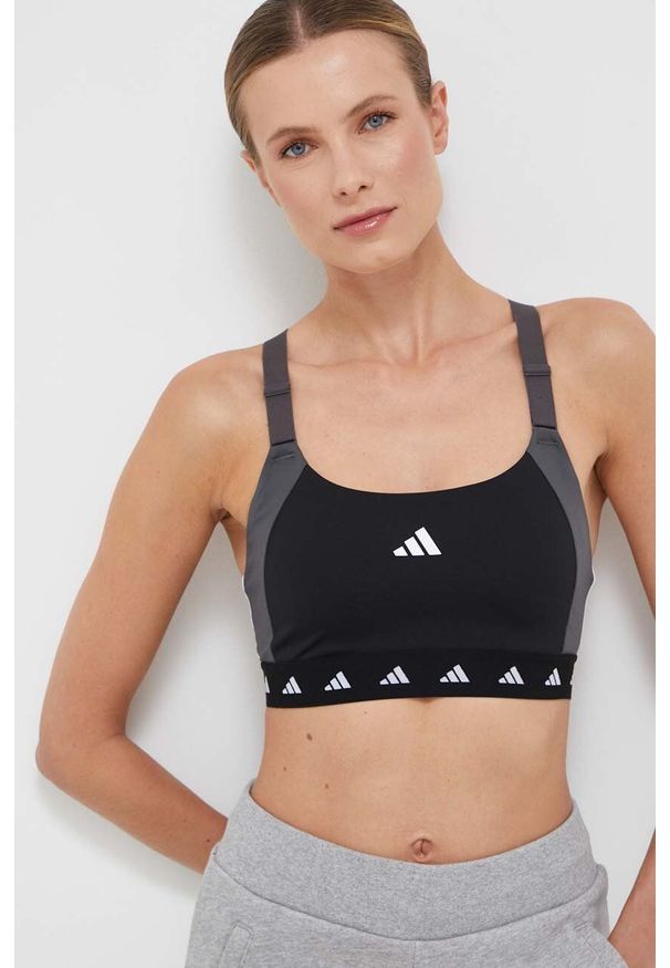 adidas Performance biustonosz sportowy Powerimpact Techfit kolor czarny wzorzysty. Kolor: czarny. Materiał: skóra, materiał. Rodzaj stanika: wyciągane miseczki. Technologia: Techfit (Adidas). Sport: fitness, taniec