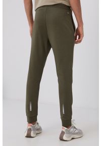 Calvin Klein Performance - Spodnie. Kolor: zielony. Materiał: dzianina. Wzór: nadruk #3