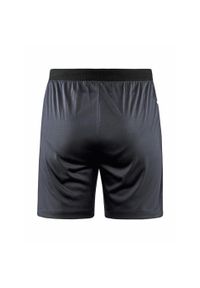 Spodnie treningowe damskie Craft Evolve Zip Pocket. Kolor: niebieski, szary, wielokolorowy. Materiał: syntetyk, materiał. Długość: krótkie. Sport: fitness