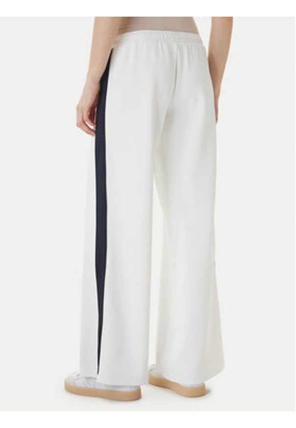 Guess Jeans Spodnie dresowe W6GBB6 KB212 Biały Relaxed Fit. Kolor: biały. Materiał: syntetyk