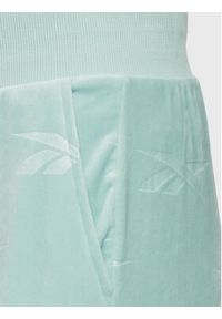 Reebok Spodnie dresowe Classics Energy Q4 HH9804 Niebieski Slim Fit. Kolor: niebieski. Materiał: syntetyk, dresówka