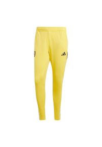 Spodnie do piłki nożnej męskie Adidas Juventus Tiro 23 Training Pants. Kolor: żółty. Materiał: dresówka, materiał, poliester