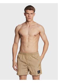 Calvin Klein Swimwear Szorty kąpielowe KM0KM00819 Beżowy Regular Fit. Kolor: beżowy. Materiał: syntetyk #3