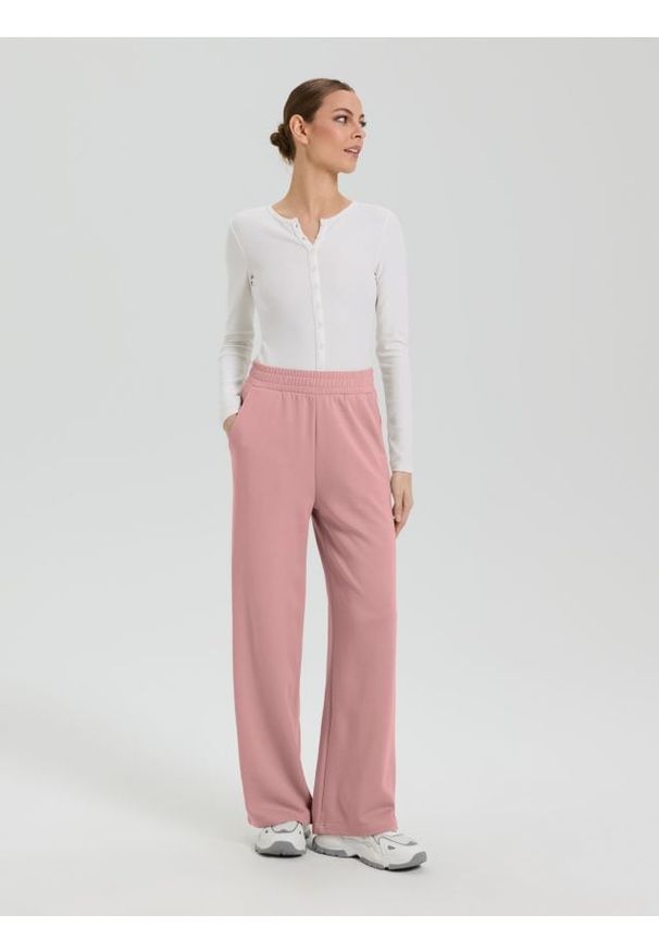 Sinsay - Spodnie z szeroką nogawką - różowy. Kolor: różowy
