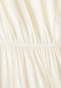 Renee - Jasnobeżowa Sukienka z Wiskozy o Rozkloszowanym Kroju z Falbanami Jonmy. Okazja: na co dzień. Typ kołnierza: dekolt w serek. Kolor: beżowy. Materiał: wiskoza. Długość rękawa: krótki rękaw. Wzór: aplikacja. Sezon: lato. Styl: casual, elegancki #5