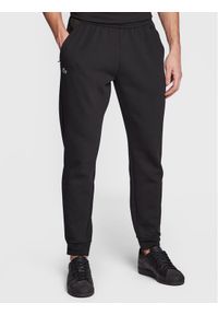 Lacoste Spodnie dresowe XH9559 Czarny Regular Fit. Kolor: czarny. Materiał: syntetyk #1