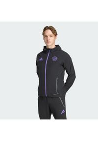 Adidas - Kurtka Manchester United Tiro 25 Competition Vis Tech Travel. Kolor: fioletowy, wielokolorowy, czarny. Materiał: dresówka. Sport: piłka nożna