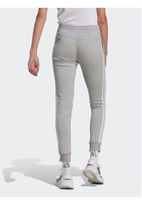 Adidas - adidas Spodnie dresowe Essentials 3-Stripes IL3282 Szary Slim Fit. Kolor: szary. Materiał: bawełna #2
