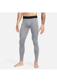 Legginsy męskie Nike Dri-FIT Fitness Tights. Kolor: szary. Materiał: materiał, poliester. Technologia: Dri-Fit (Nike). Sport: fitness