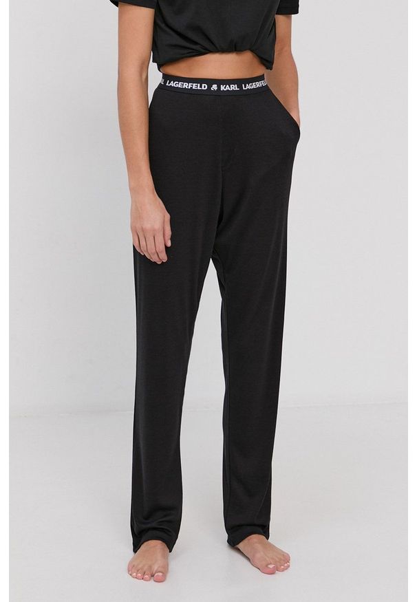 Karl Lagerfeld Spodnie piżamowe damskie kolor czarny. Kolor: czarny. Materiał: bawełna, materiał, dzianina, lyocell, tkanina, jedwab. Wzór: melanż