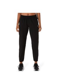Damskie spodnie dresowe Asics Core. Kolor: czarny. Materiał: dresówka. Długość: długie #1