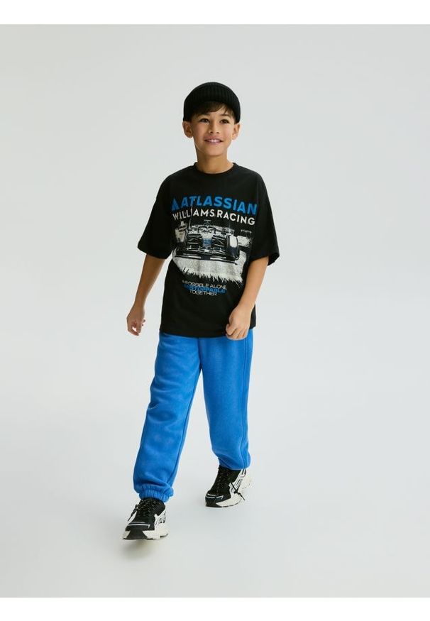 Reserved - Bawełniane spodnie jogger - jasnoniebieski. Kolor: niebieski. Materiał: bawełna. Wzór: gładki