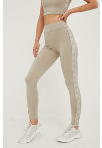 Guess legginsy damskie kolor beżowy z nadrukiem. Stan: podwyższony. Kolor: beżowy. Wzór: nadruk #3