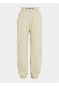 Calvin Klein Jeans Spodnie dresowe Intrasia Logo IB0IB02081 Beżowy Regular Fit. Kolor: beżowy. Materiał: bawełna #4