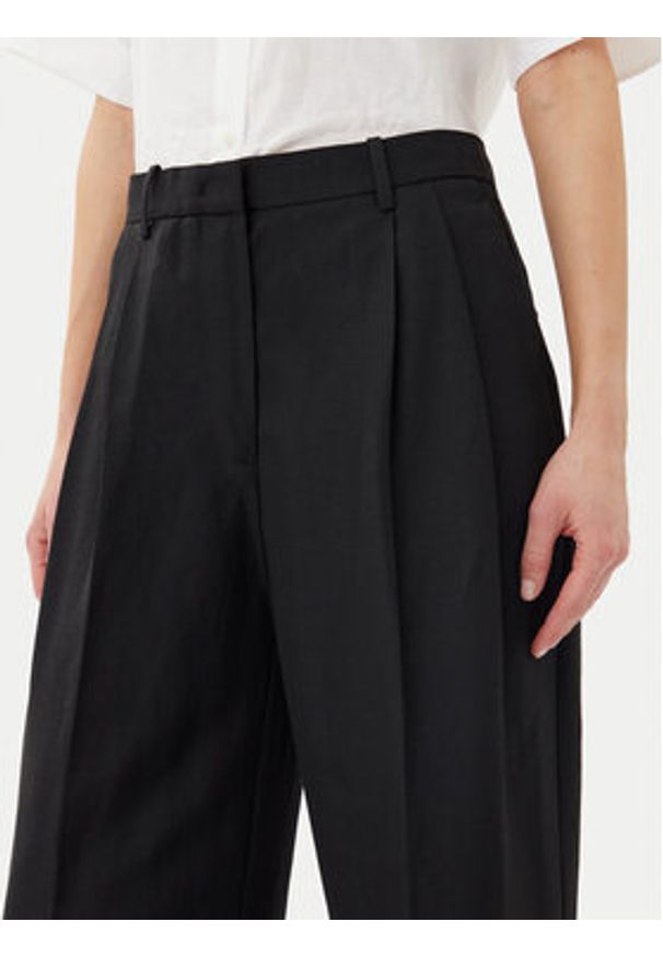 TOMMY HILFIGER - Tommy Hilfiger Spodnie materiałowe WW0WW45460 Czarny Relaxed Fit. Kolor: czarny. Materiał: len