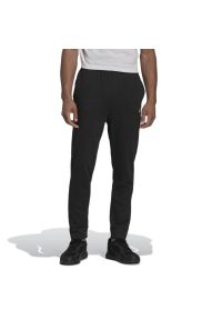 Adidas - Spodnie adidas Essentials French Terry Melange Joggers HE1794 - czarne. Kolor: czarny. Materiał: bawełna, poliester, wiskoza, materiał, dresówka