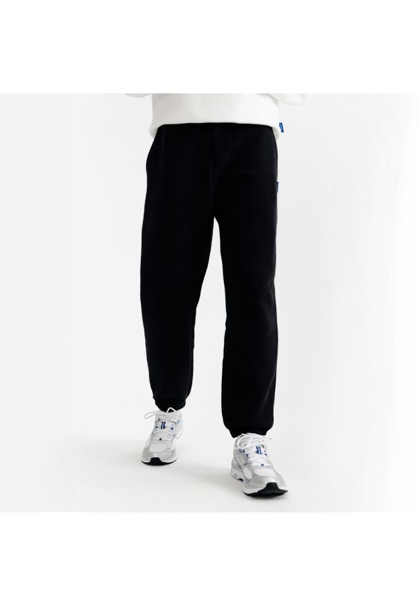 Decathlon - Spodnie męskie Elementals. Kolor: czarny. Materiał: poliester, bawełna, materiał