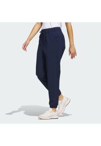 Adidas - Spodnie dresowe Women's Ultimate365. Kolor: niebieski. Materiał: dresówka. Sport: golf #1