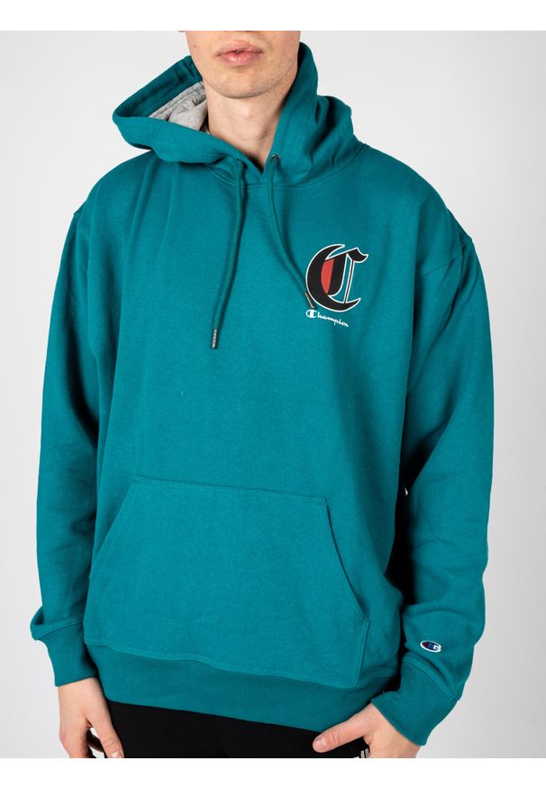 Champion Bluza "Hoodie" | HBGF89H586NKA | Mężczyzna | Turkusowy. Okazja: na co dzień. Typ kołnierza: kaptur. Kolor: turkusowy. Materiał: bawełna, poliester. Wzór: aplikacja, nadruk. Styl: casual