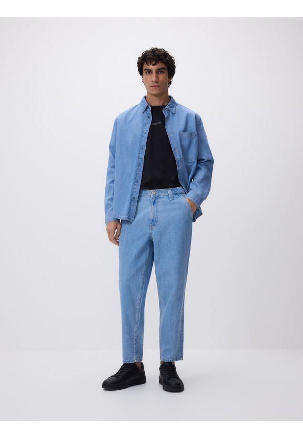 Reserved - Jeansy carrot fit - niebieski. Kolor: niebieski