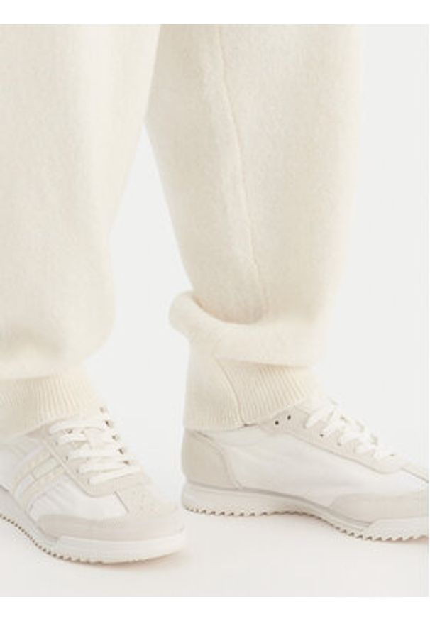 Calvin Klein Underwear Spodnie dresowe LV00QS7569 Écru Regular Fit. Materiał: syntetyk