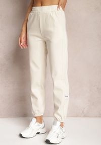 Renee - Jasnobeżowe Bawełniane Spodnie Dresowe Grypina. Kolor: beżowy. Materiał: bawełna, dresówka #2