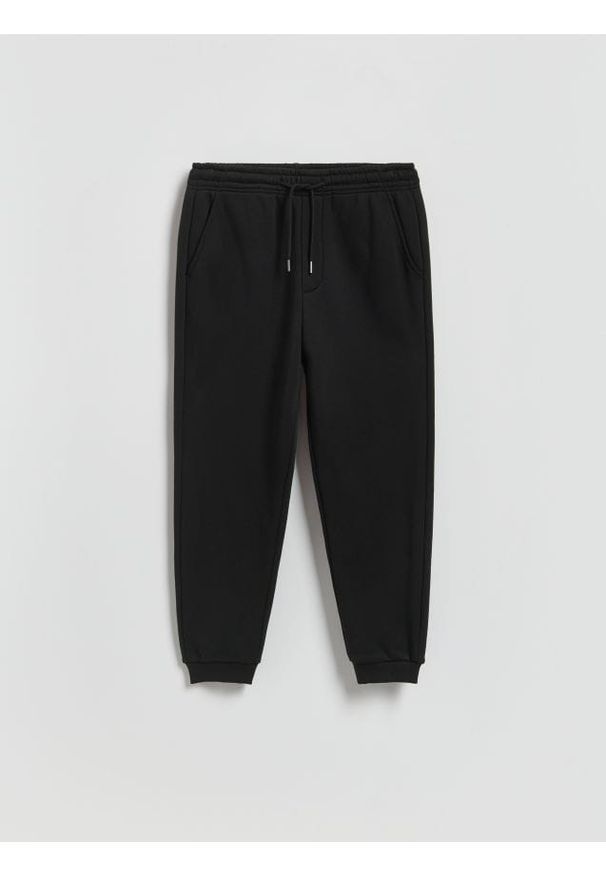 Reserved - Spodnie dresowe regular fit - czarny. Kolor: czarny. Materiał: dresówka