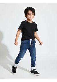 Sinsay - Jeansy jogger z efektem sprania - granatowy. Kolor: niebieski