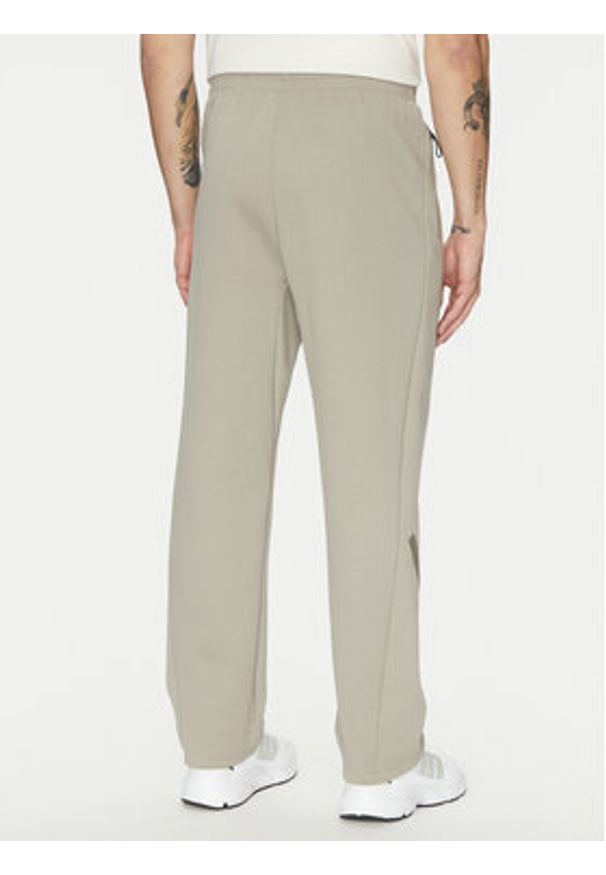 Adidas - adidas Spodnie dresowe Z.N.E. Open-Hem JC6716 Beżowy Loose Fit. Kolor: beżowy. Materiał: bawełna
