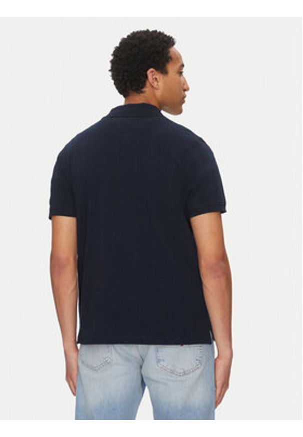 Tommy Jeans Polo Linear DM0DM20914 Granatowy Regular Fit. Typ kołnierza: polo. Kolor: niebieski. Materiał: bawełna