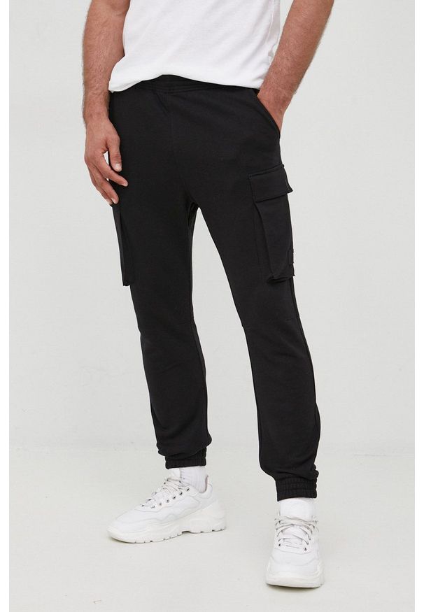 G-Star RAW - G-Star Raw spodnie dresowe męskie kolor czarny gładkie. Kolor: czarny. Materiał: dresówka. Wzór: gładki