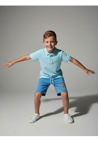 Sinsay - Koszulka polo - błękitny. Typ kołnierza: polo. Kolor: niebieski #1