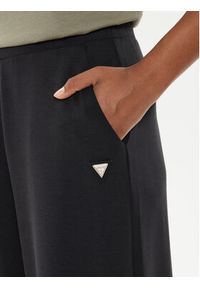 Guess Spodnie dresowe V4YB07 KCAY2 Czarny Relaxed Fit. Kolor: czarny. Materiał: syntetyk #5