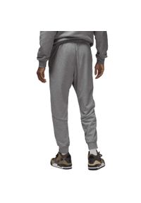 Nike - Spodnie Dri-FIT Sport Crossover Rozmiar XL Szary - DQ7332-091. Kolor: szary. Materiał: dzianina. Technologia: Dri-Fit (Nike). Sport: fitness