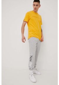 New Balance spodnie dresowe męskie kolor szary melanżowe. Kolor: szary. Materiał: dresówka. Wzór: melanż