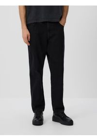 Reserved - Jeansy carrot fit - czarny. Kolor: czarny