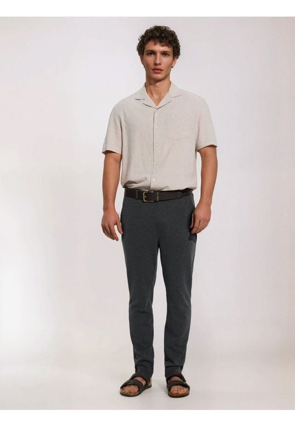 Sinsay - Spodnie slim fit - czarny. Kolor: czarny