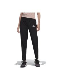 Adidas - Spodnie adidas Melbourne Tennis Woven HA7611 - czarne. Kolor: czarny. Materiał: materiał, dresówka, poliester. Sport: turystyka piesza, fitness