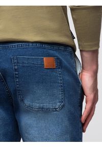 Ombre Clothing - Męskie spodnie JOGGERY jeansowe z efektem sprania - niebieskie V2 - Rozmiar: XL. Okazja: na co dzień. Kolor: niebieski. Materiał: jeans. Wzór: aplikacja. Styl: casual, elegancki #5