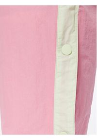 Asics Spodnie dresowe Tiger 2032C687 Różowy Relaxed Fit. Kolor: różowy. Materiał: syntetyk #2