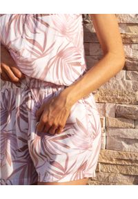 CAHA CAPO DUBAI - Beżowy kombinezon Lola. Kolor: beżowy. Materiał: guma, materiał. Długość rękawa: bez ramiączek. Wzór: nadruk #3