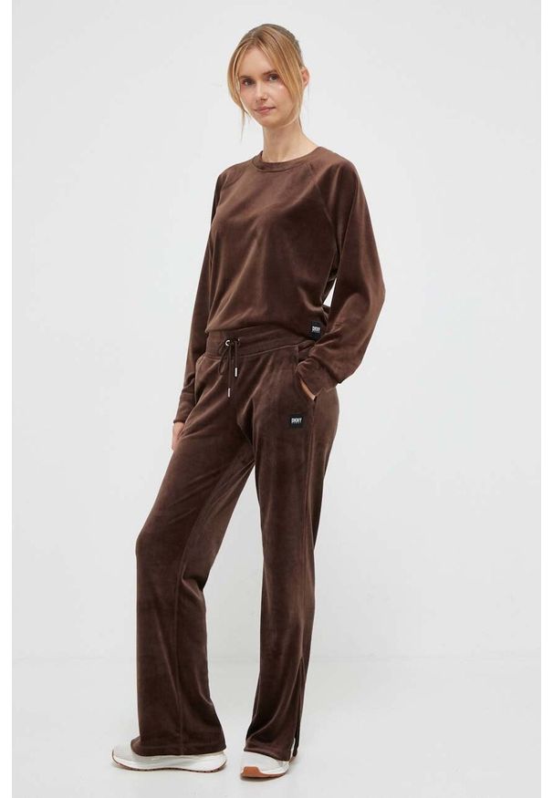 DKNY - Dkny spodnie dresowe kolor brązowy gładkie. Kolor: brązowy. Materiał: dresówka. Wzór: gładki