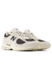 Buty unisex New Balance U2002RN – beżowe. Kolor: beżowy. Materiał: zamsz, guma. Szerokość cholewki: normalna #3